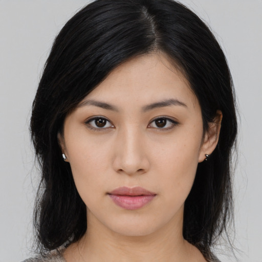 Neutral asian young-adult female with medium  black hair and brown eyes