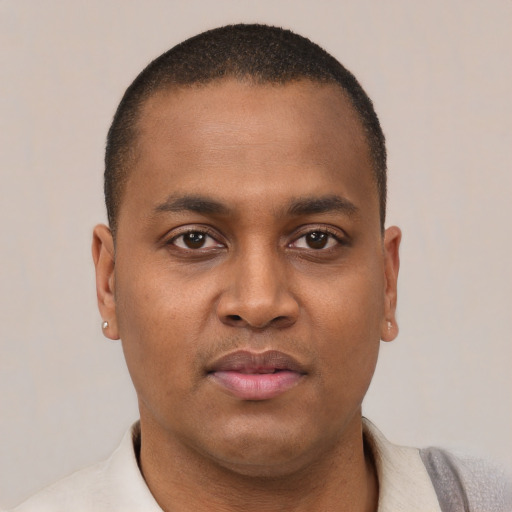 Neutral black young-adult male with short  brown hair and brown eyes