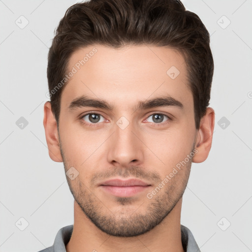 Neutral white young-adult male with short  brown hair and brown eyes