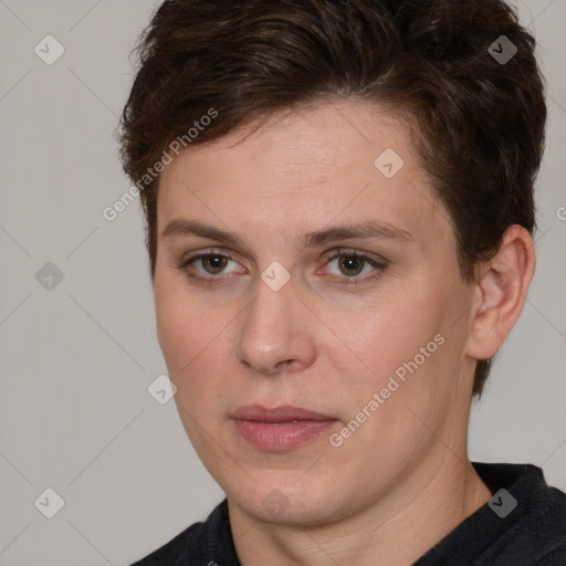 Joyful white adult female with short  brown hair and brown eyes