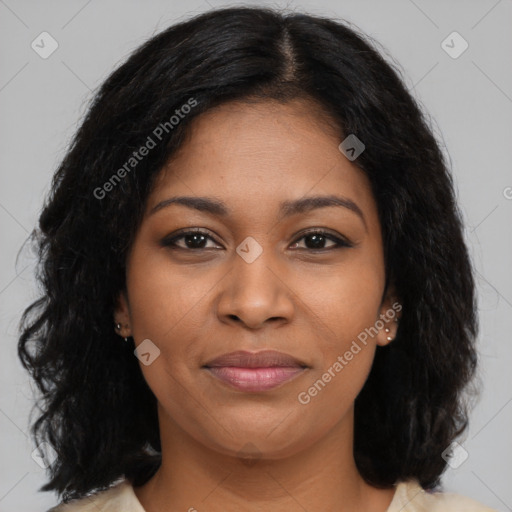 Joyful black young-adult female with long  brown hair and brown eyes