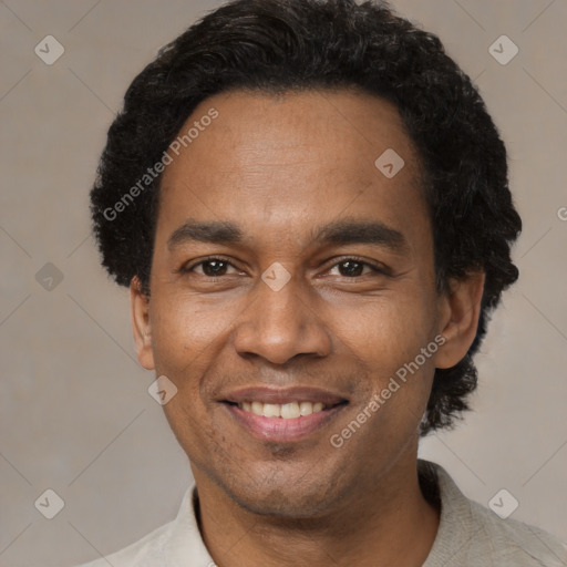 Joyful latino adult male with short  black hair and brown eyes