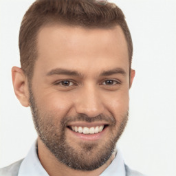 Joyful white young-adult male with short  brown hair and brown eyes