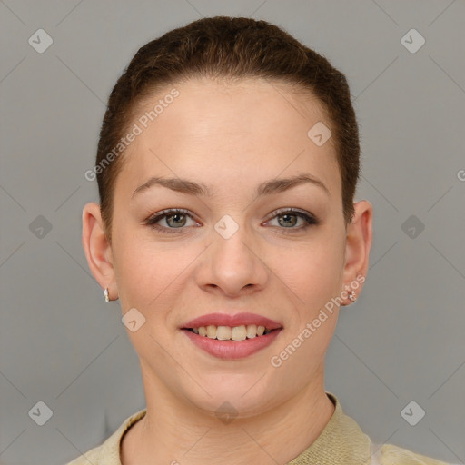 Joyful white young-adult female with short  brown hair and grey eyes