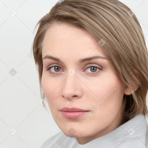 Neutral white young-adult female with medium  brown hair and grey eyes