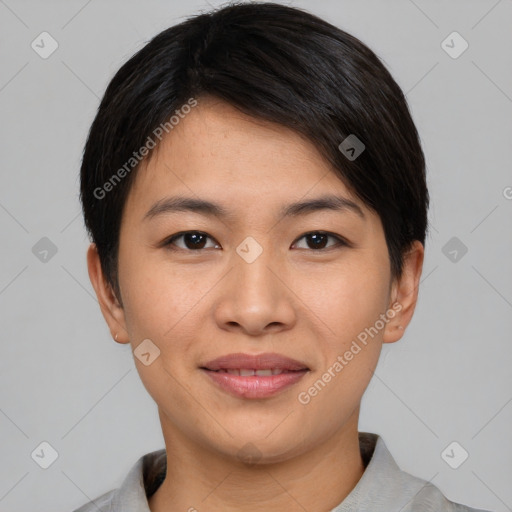 Joyful asian young-adult female with short  black hair and brown eyes