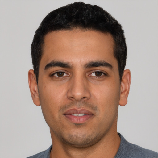 Neutral latino young-adult male with short  black hair and brown eyes