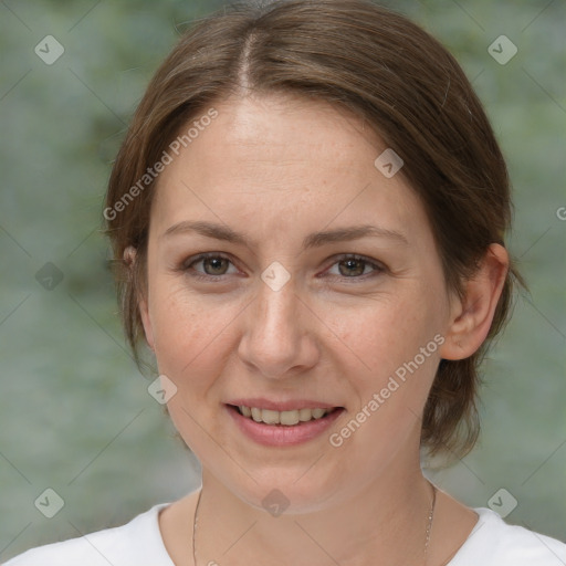 Joyful white adult female with medium  brown hair and brown eyes