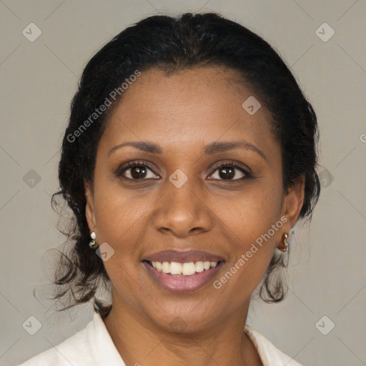 Joyful black young-adult female with medium  brown hair and brown eyes