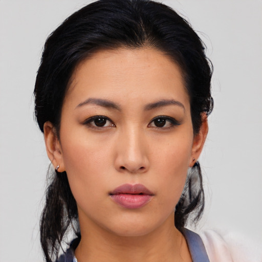 Neutral asian young-adult female with medium  black hair and brown eyes