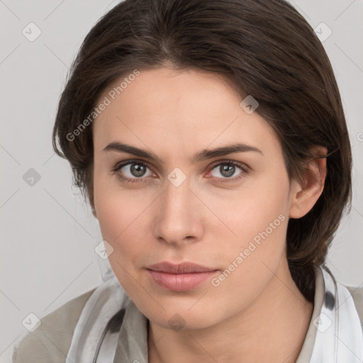 Neutral white young-adult female with medium  brown hair and brown eyes