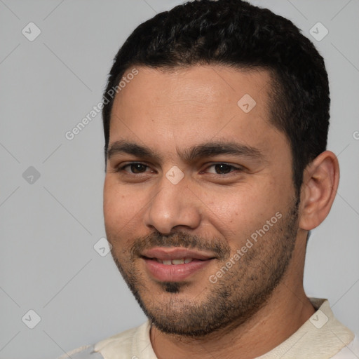 Joyful white young-adult male with short  black hair and brown eyes