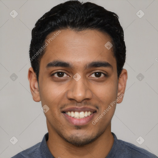 Joyful latino young-adult male with short  black hair and brown eyes