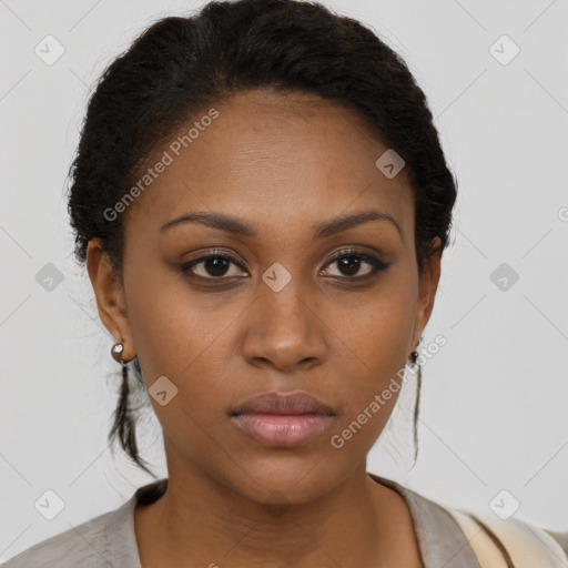 Neutral black young-adult female with short  brown hair and brown eyes