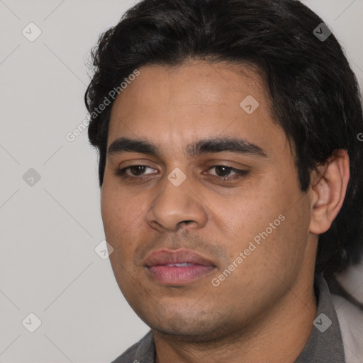 Neutral latino young-adult male with short  black hair and brown eyes