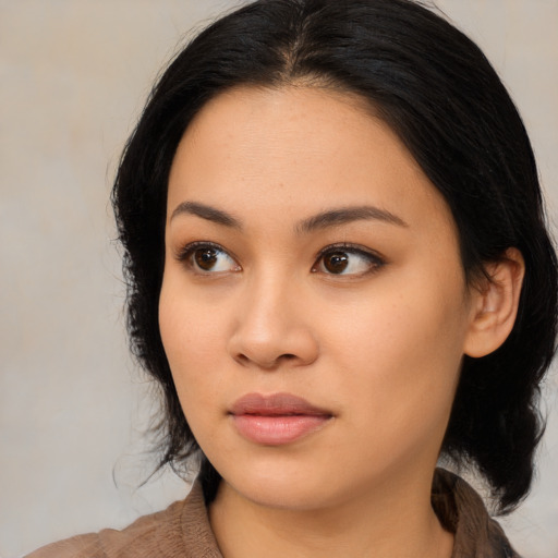 Neutral asian young-adult female with long  black hair and brown eyes
