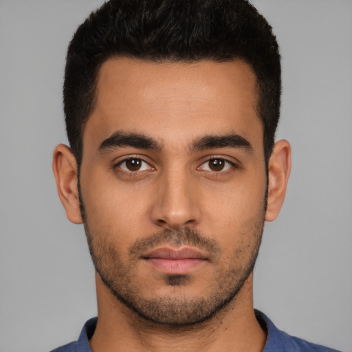 Neutral latino young-adult male with short  black hair and brown eyes