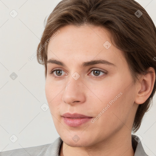 Neutral white young-adult female with short  brown hair and grey eyes