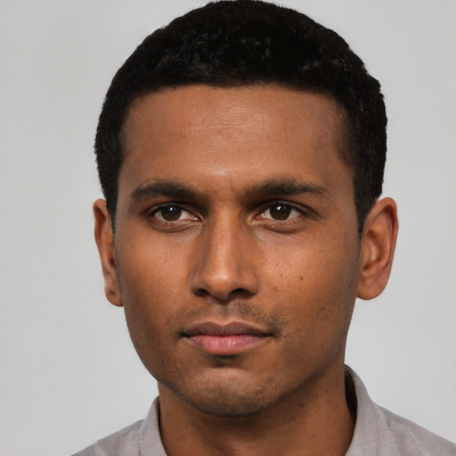 Neutral black young-adult male with short  black hair and brown eyes