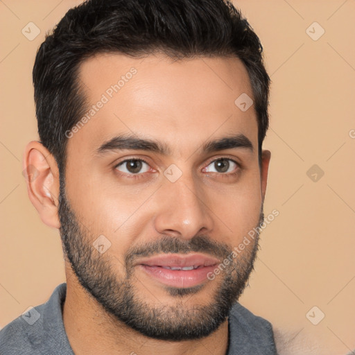 Joyful white young-adult male with short  black hair and brown eyes