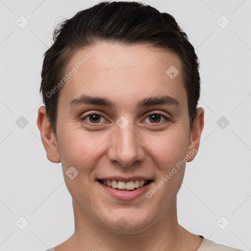 Joyful white young-adult male with short  brown hair and brown eyes