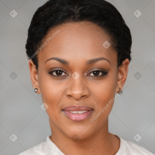 Joyful black young-adult female with short  black hair and brown eyes