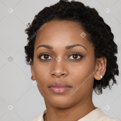 Neutral black young-adult female with short  black hair and brown eyes