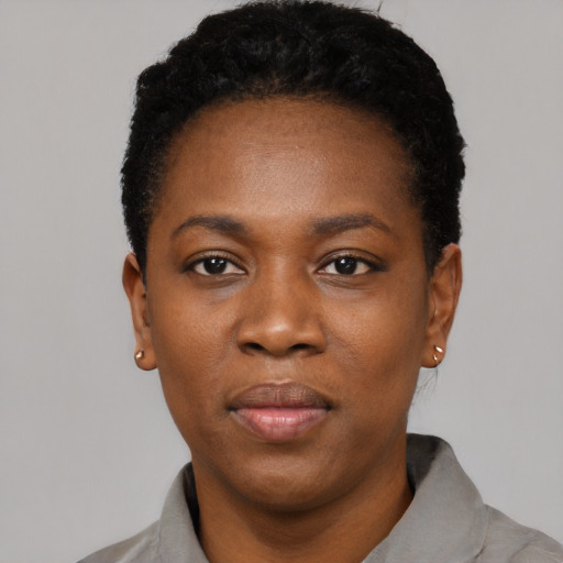 Neutral black young-adult female with short  black hair and brown eyes
