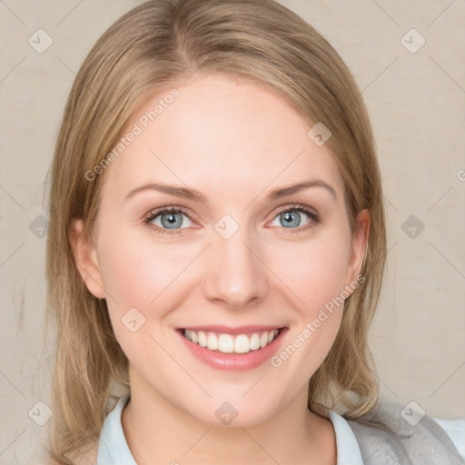 Joyful white young-adult female with medium  brown hair and blue eyes