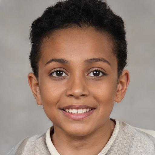 Joyful latino child female with short  brown hair and brown eyes