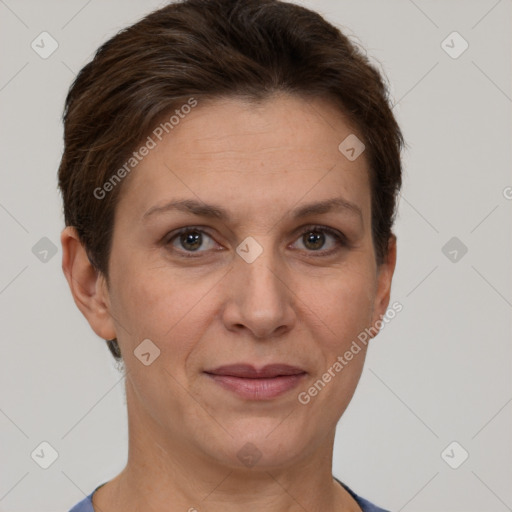 Joyful white adult female with short  brown hair and brown eyes