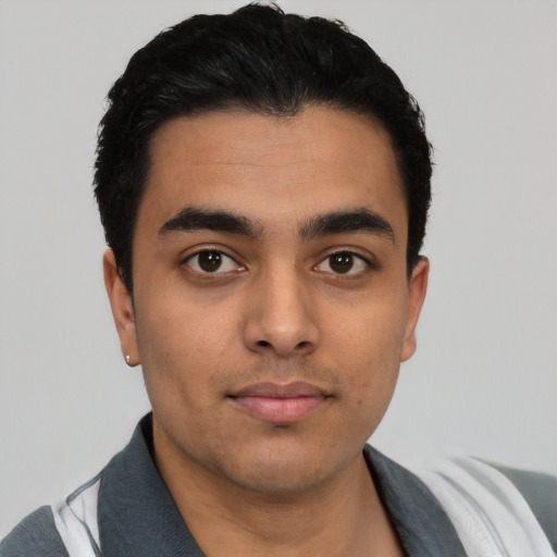Neutral latino young-adult male with short  black hair and brown eyes