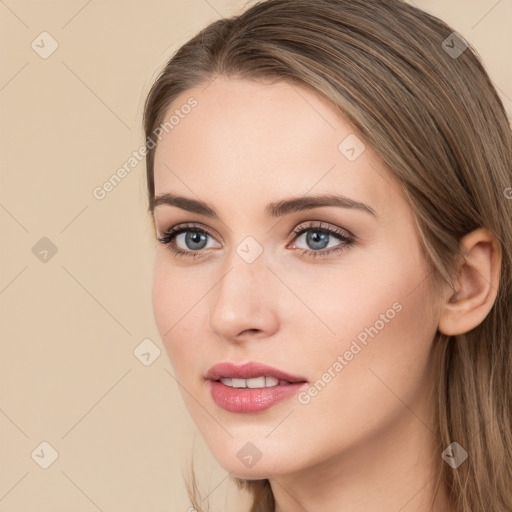 Neutral white young-adult female with long  brown hair and brown eyes