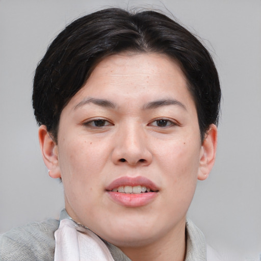 Joyful asian young-adult female with short  brown hair and brown eyes