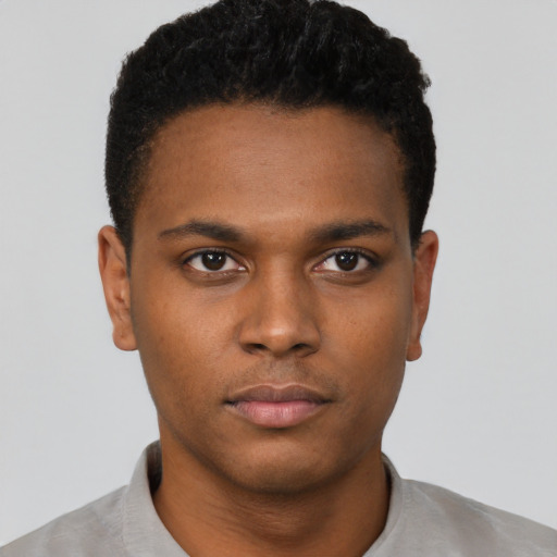 Neutral black young-adult male with short  black hair and brown eyes