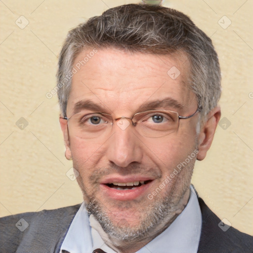 Joyful white adult male with short  brown hair and grey eyes