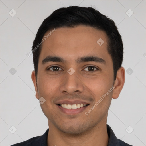 Joyful latino young-adult male with short  black hair and brown eyes