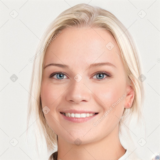 Joyful white young-adult female with medium  brown hair and blue eyes