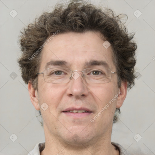 Joyful white adult male with short  brown hair and grey eyes