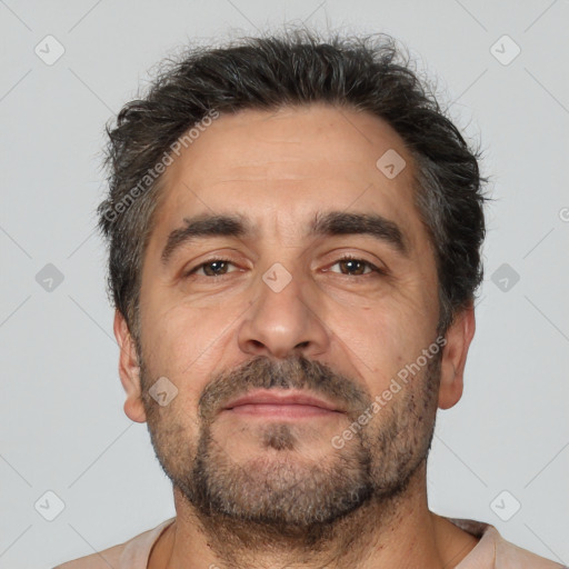 Neutral white adult male with short  brown hair and brown eyes