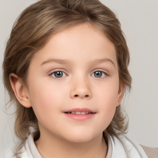 Joyful white child female with medium  brown hair and brown eyes