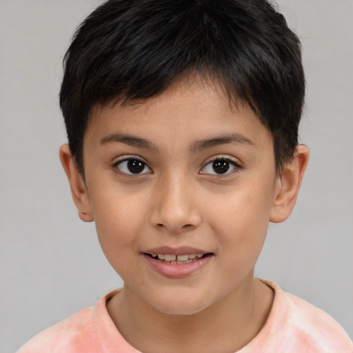 Joyful asian child female with short  brown hair and brown eyes