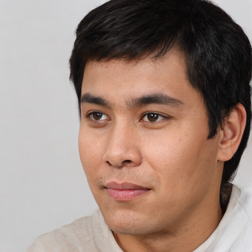 Neutral white young-adult male with short  black hair and brown eyes