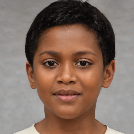 Joyful black child female with short  black hair and brown eyes