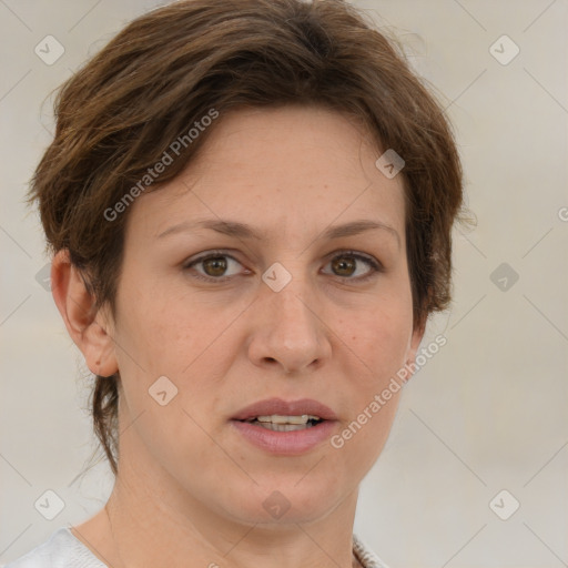 Joyful white adult female with medium  brown hair and grey eyes