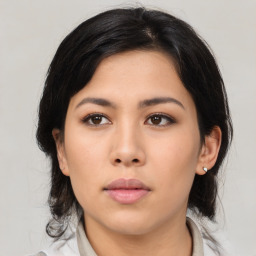 Neutral asian young-adult female with medium  black hair and brown eyes