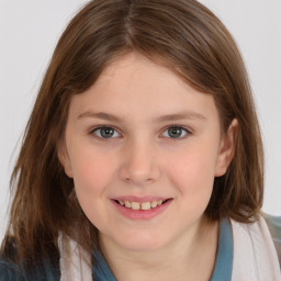 Joyful white child female with medium  brown hair and brown eyes