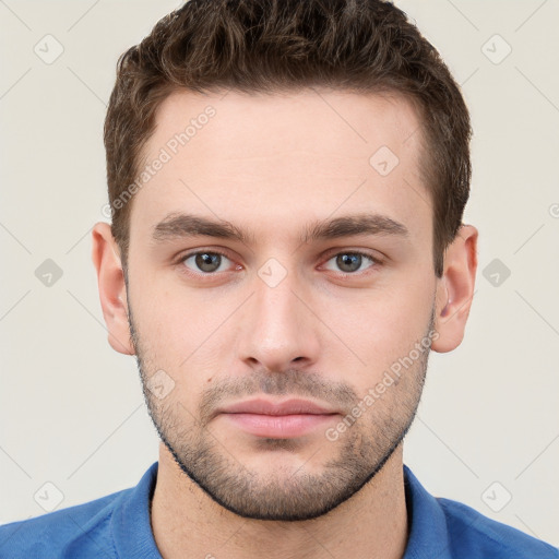 Neutral white young-adult male with short  brown hair and grey eyes