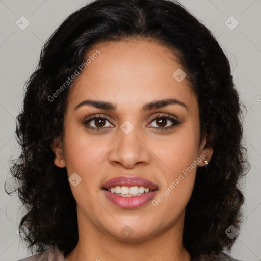 Joyful latino young-adult female with long  brown hair and brown eyes