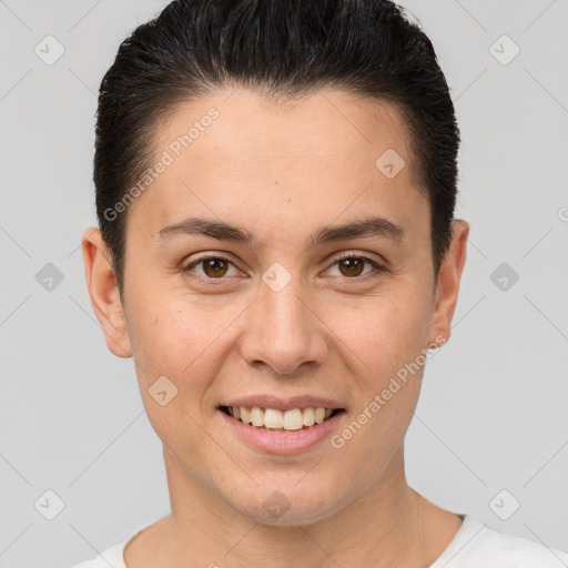 Joyful white young-adult female with short  brown hair and brown eyes